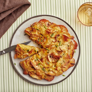 Sour Cream  Onion Potato Chip Tortilla Espanola on a white plate